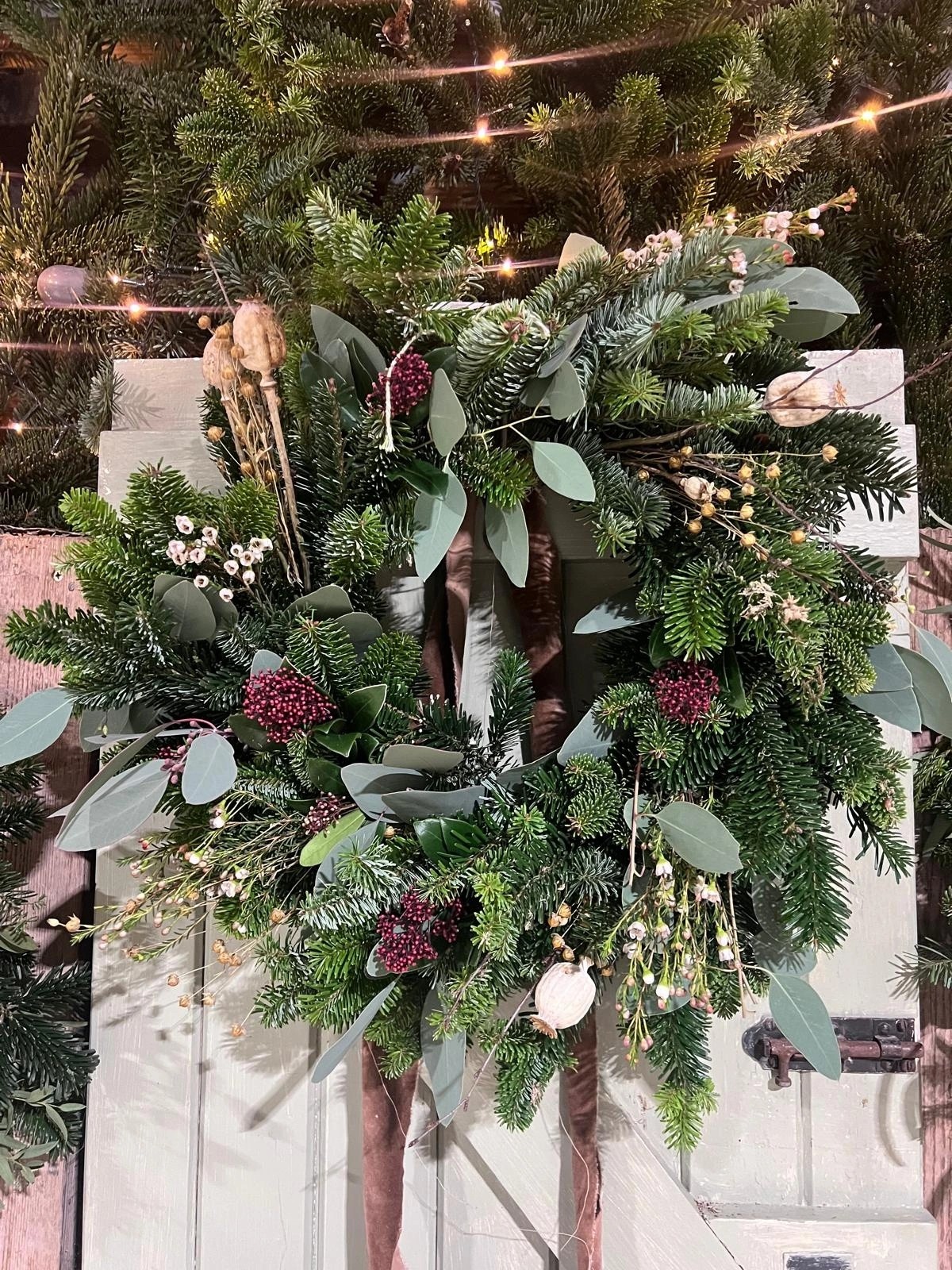 Seasonal Christmas wreath by Moo's Flowers on the Suffolk-Essex border