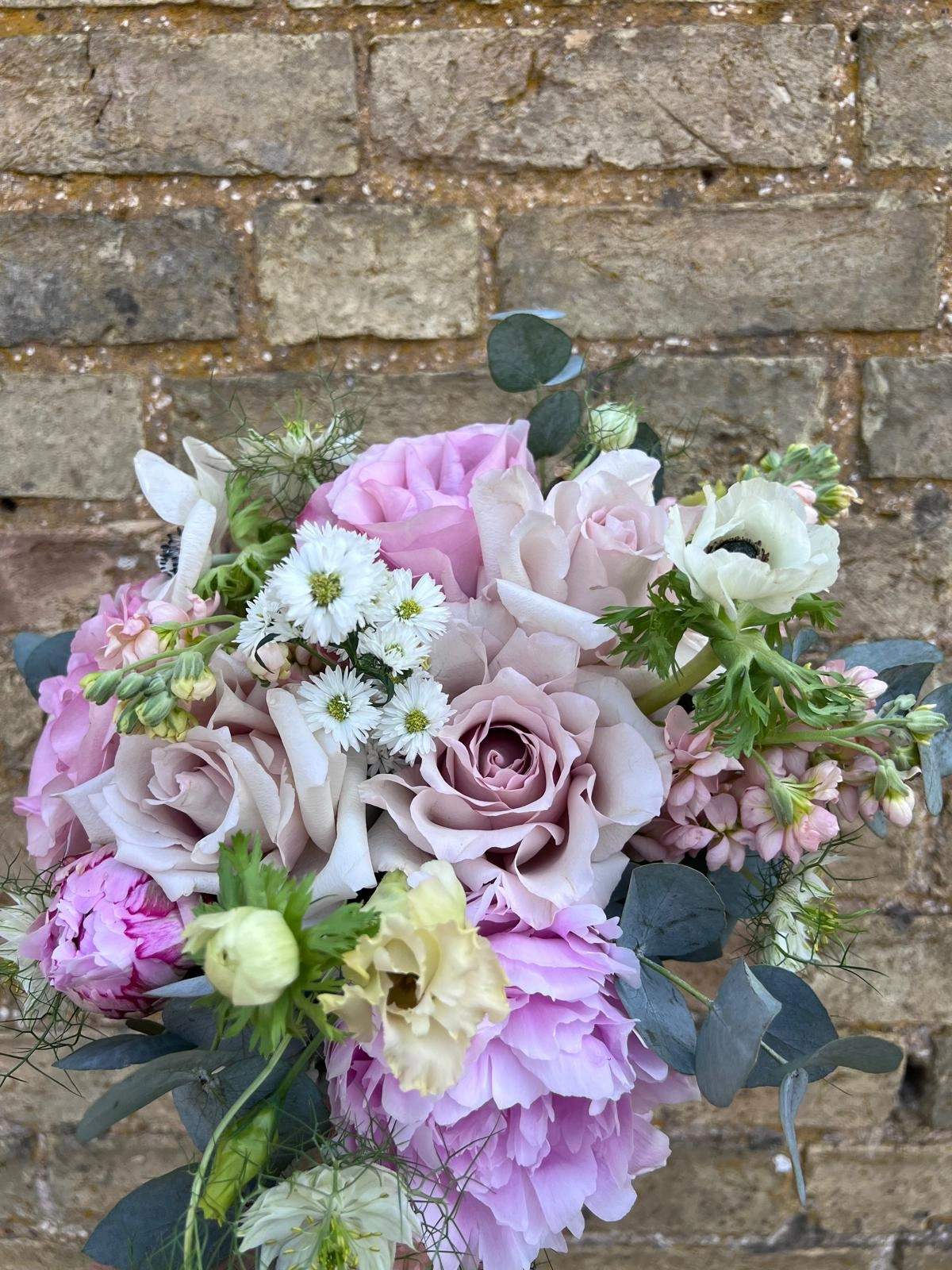 Statement floral bouquet with layered textures by Moo's Flowers
